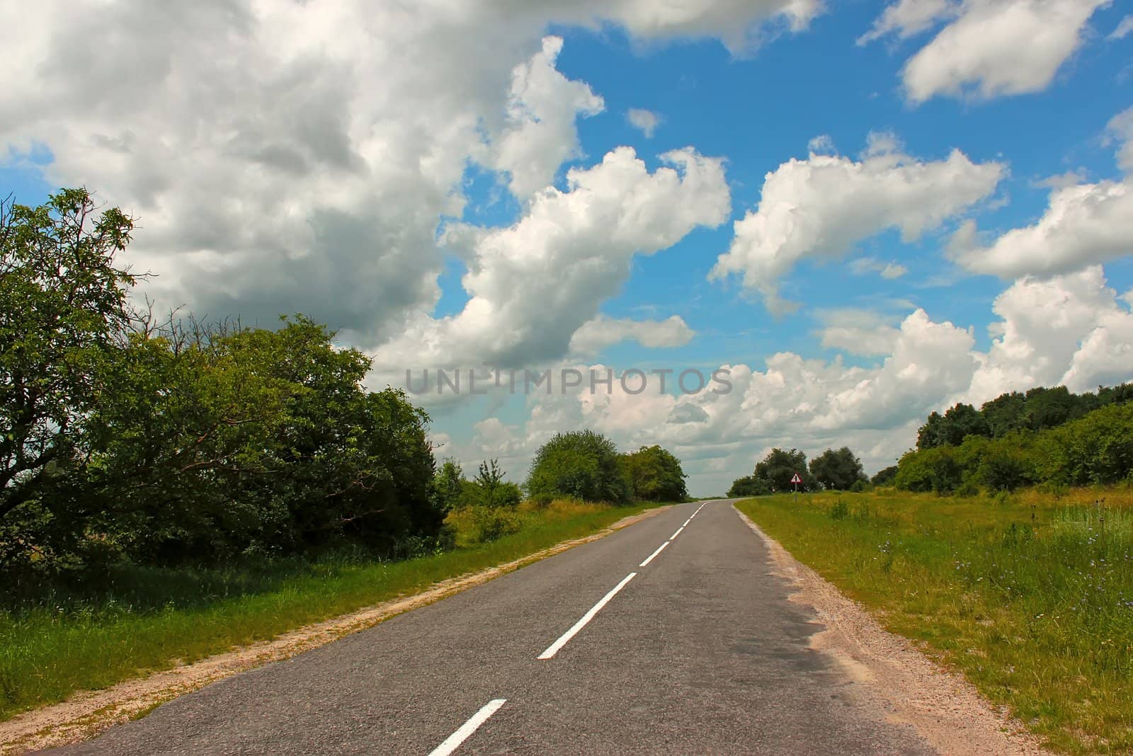 Rural paved road  by qiiip