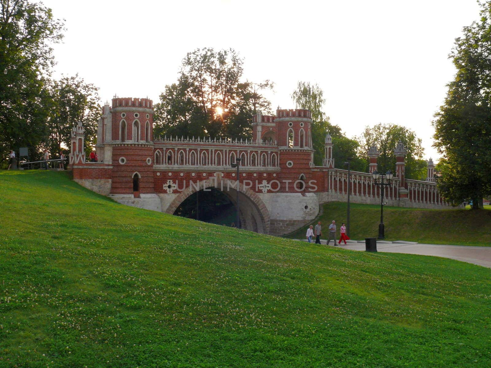 Red brick bridge in Tsaritsino, Moscow by Stoyanov