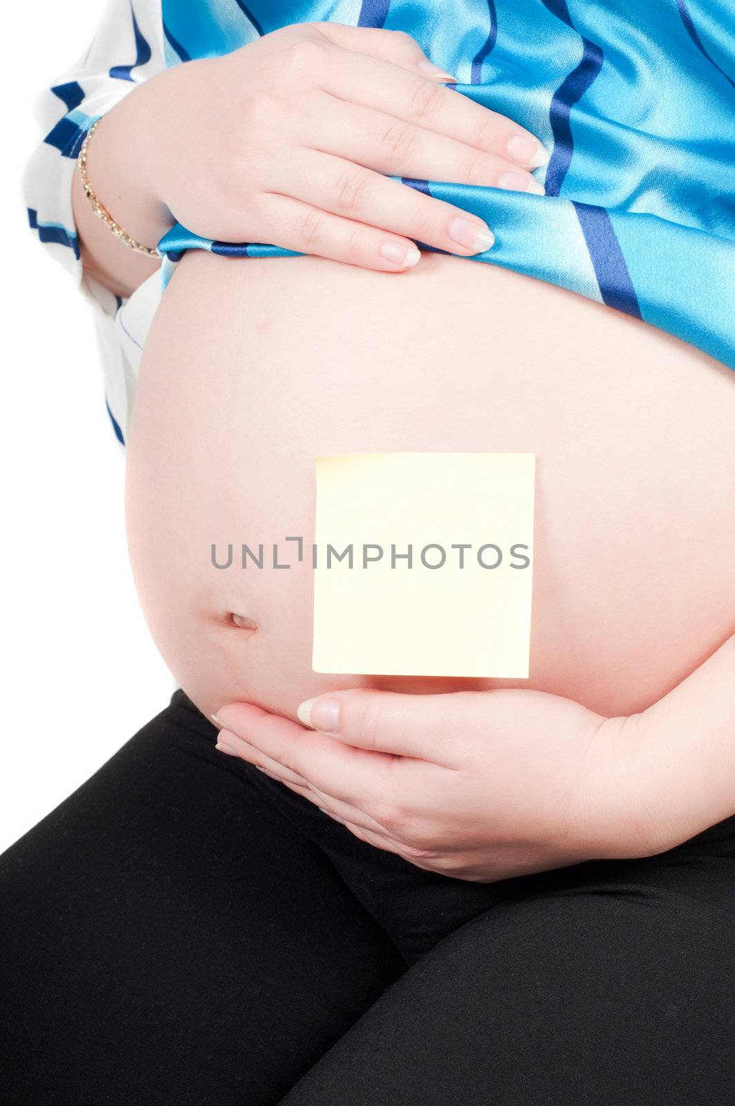 Shot of pregnant woman's belly with copy-space stickers