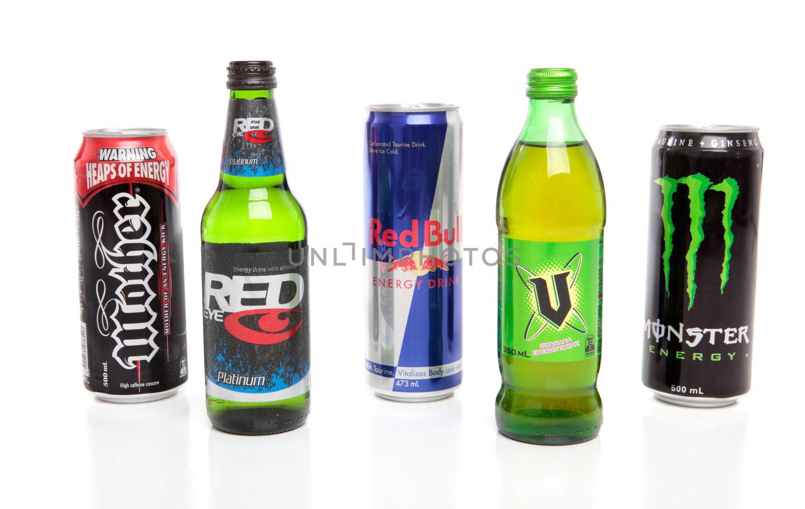 Varieties of Energy drinks on a white background.  Brands include Mother, V, Red Bull, Red Eye, Monster. EDITORIAL USE ONLY.
