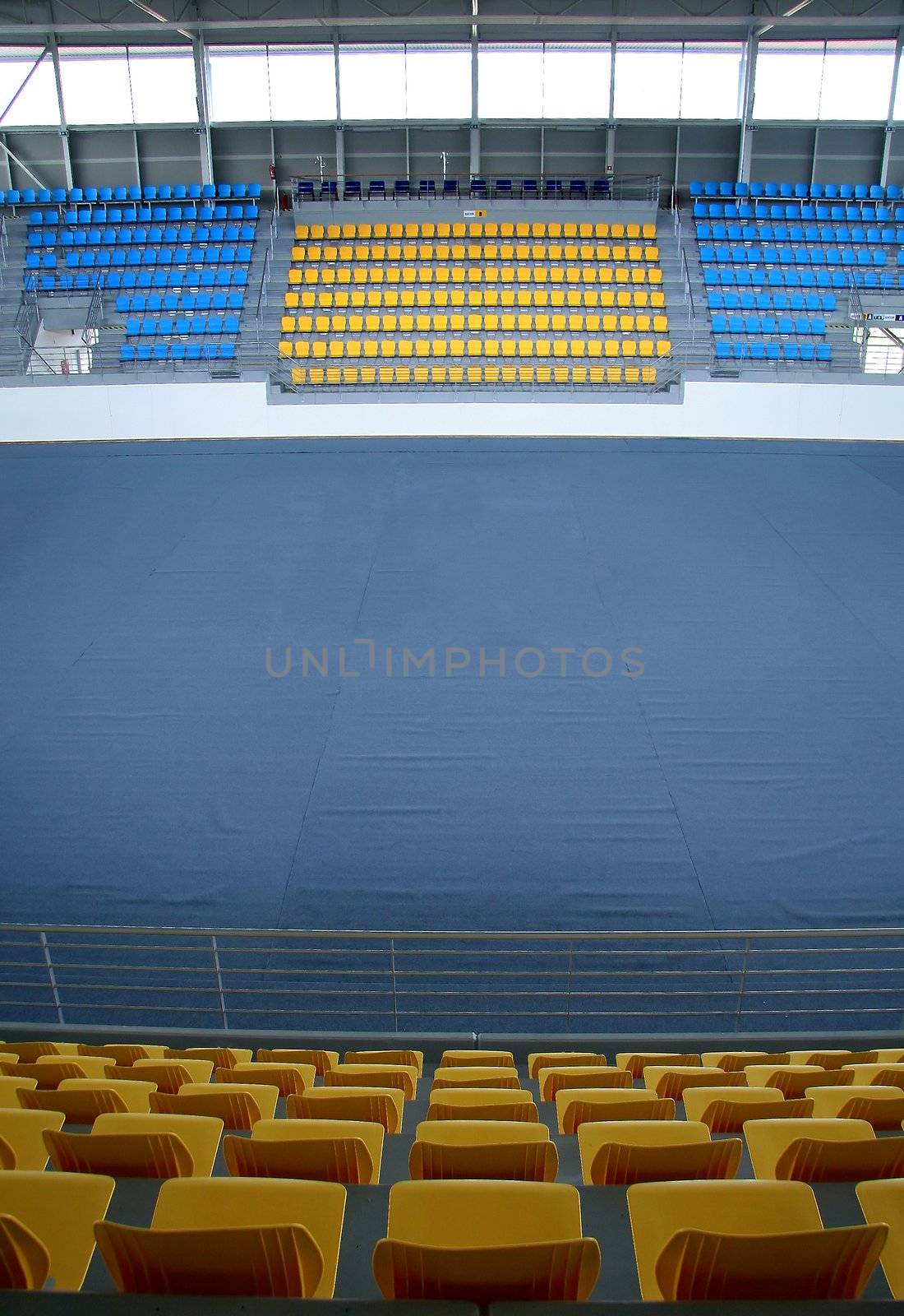 empty sport hall stadium interior photo, blue and yellow seats