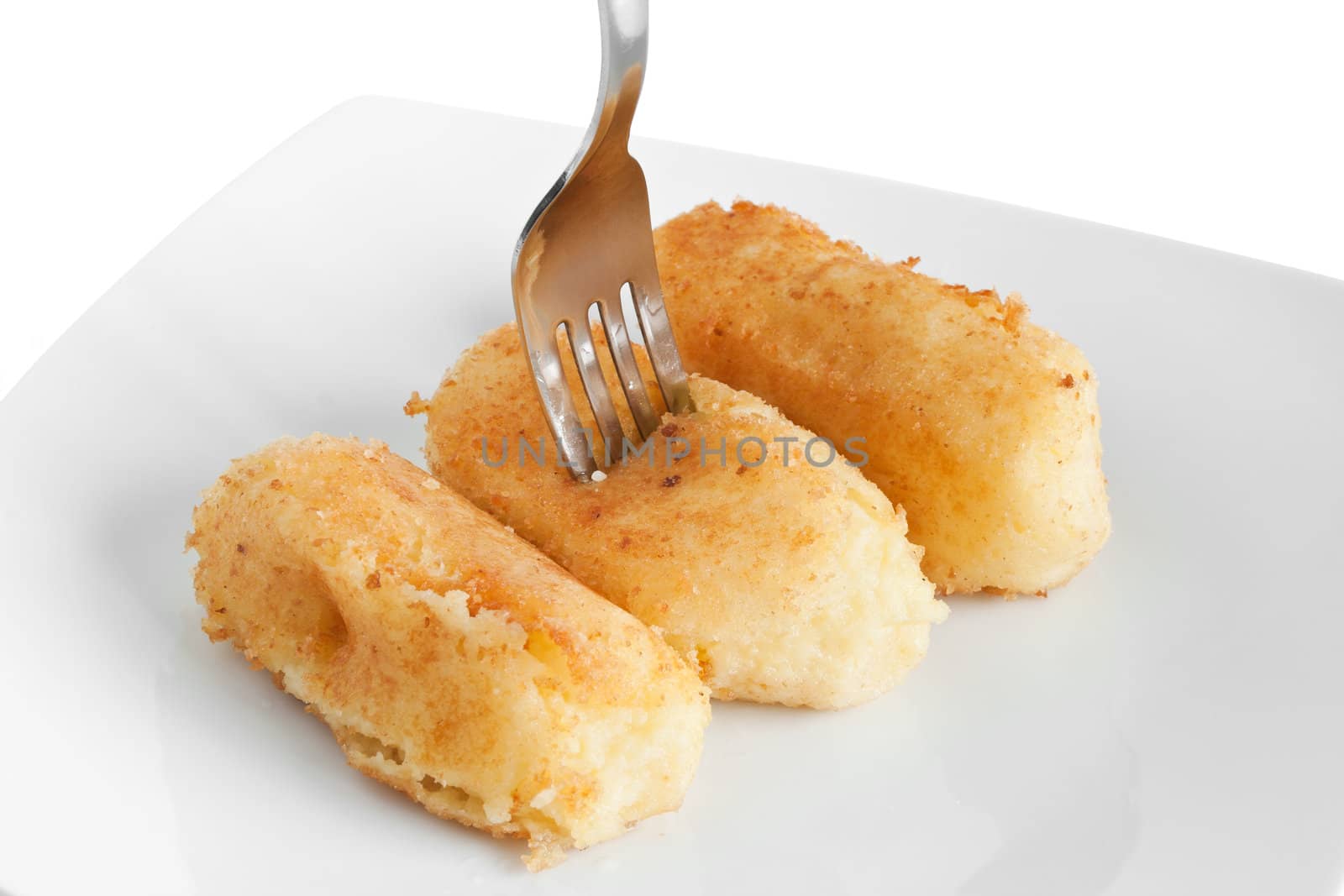 dish with potato croquettes isolated on white background with clipping path