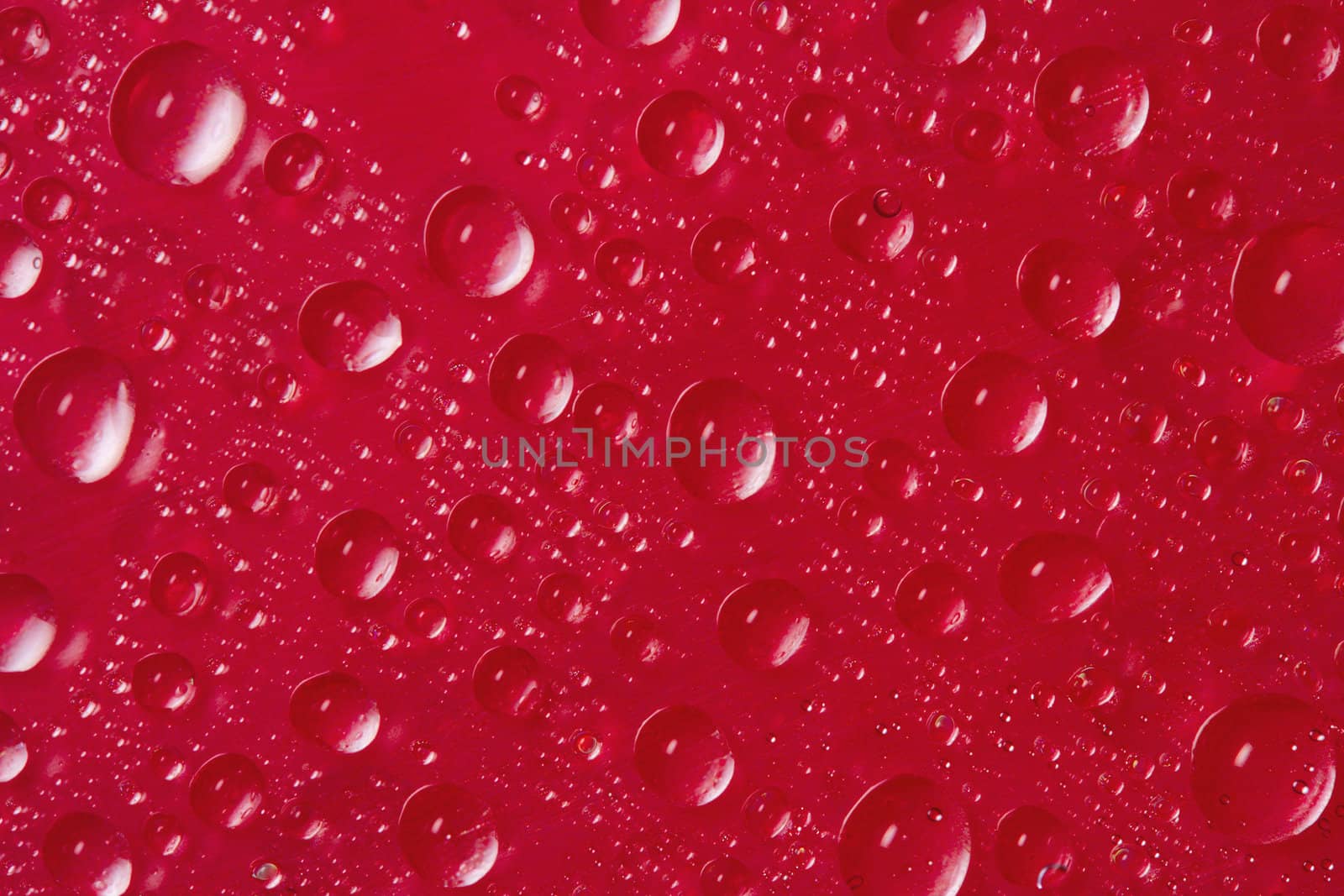 drops of water on red by Alekcey