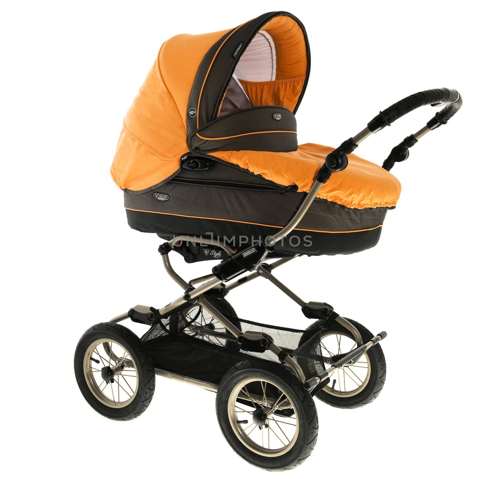 Orange baby stroller isolated in a white background