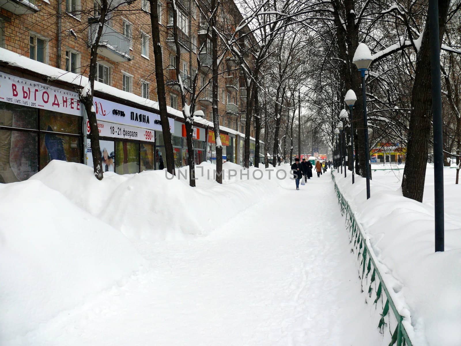 Snowdrifts in the streets after snowfall in Moscow by Stoyanov