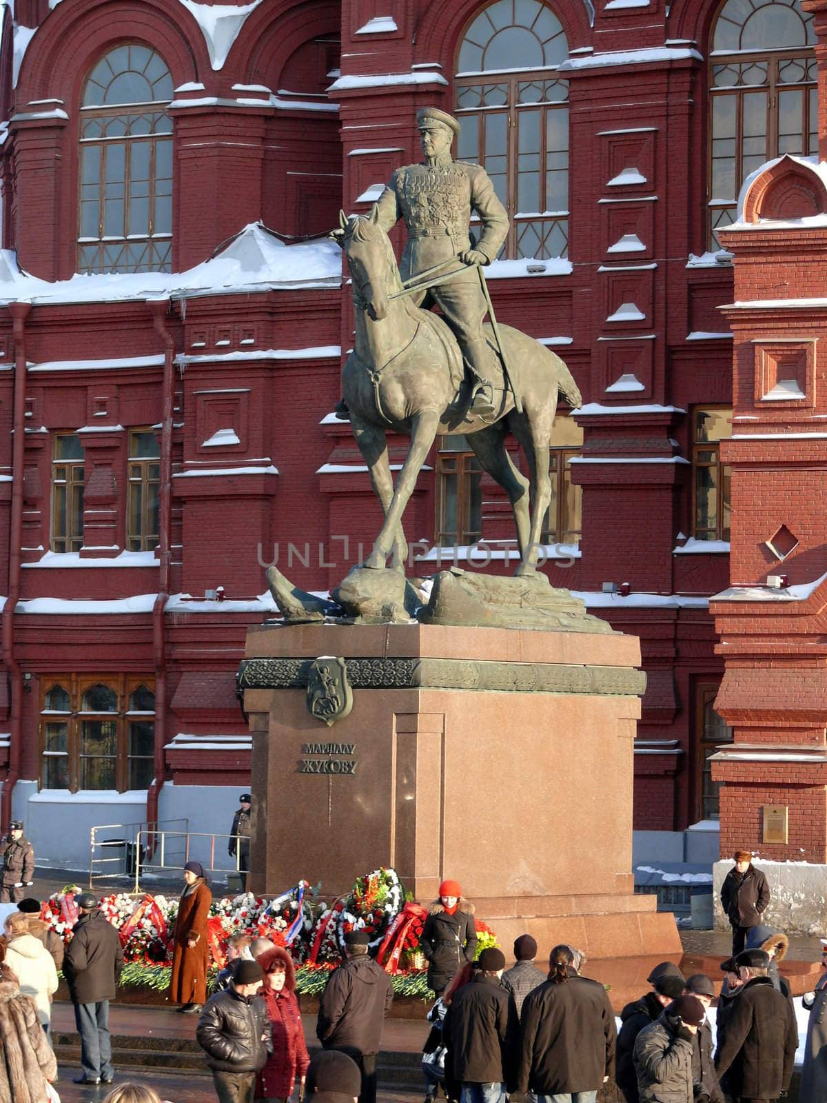 Moscow, Russia - February 23, 2010: Winter day. Peoples walks near monument of Marshal Zhukov in Moscow, Russia