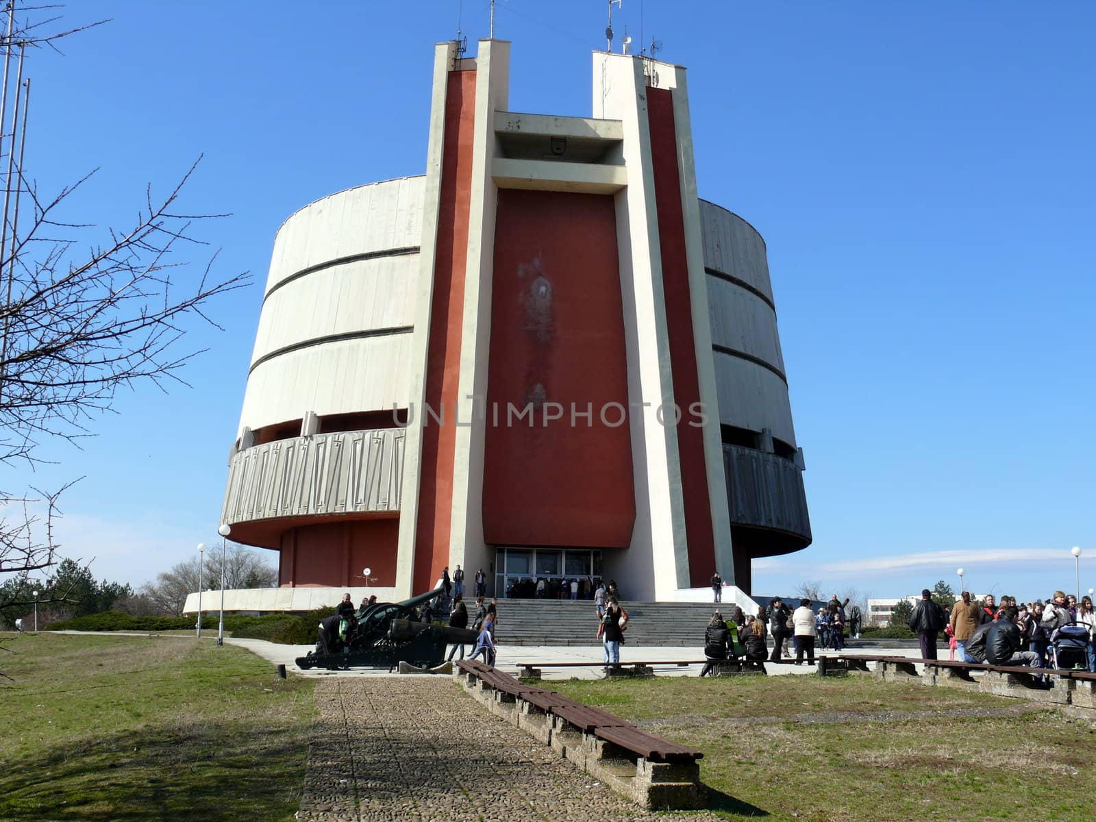 Pleven, Bulgaria - March 03, 2010: Spring day. Peoples walks near Pleven panorama in Skobelev park.  Pleven, Bulgaria