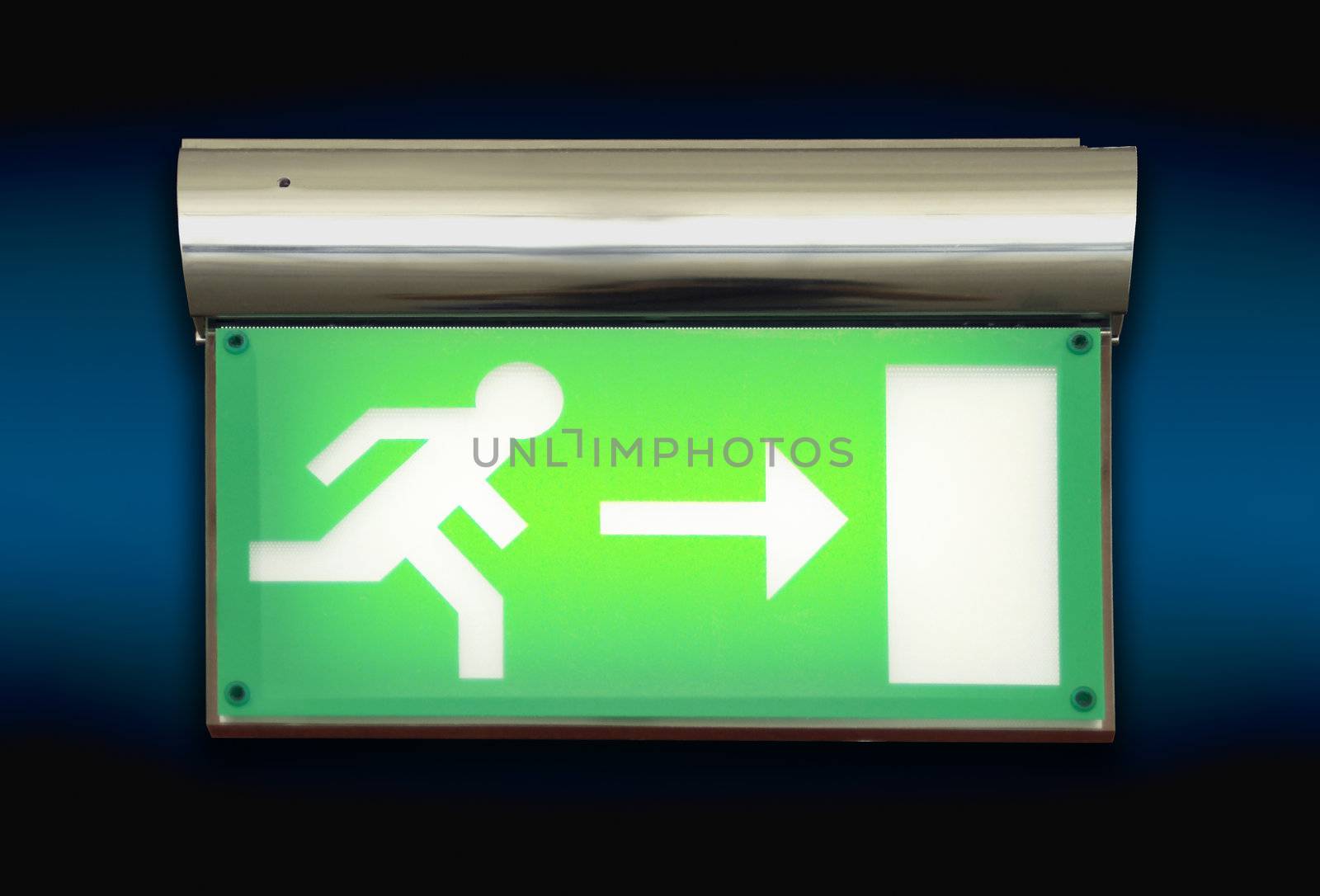 Emergency exit sign glowing green by cienpies