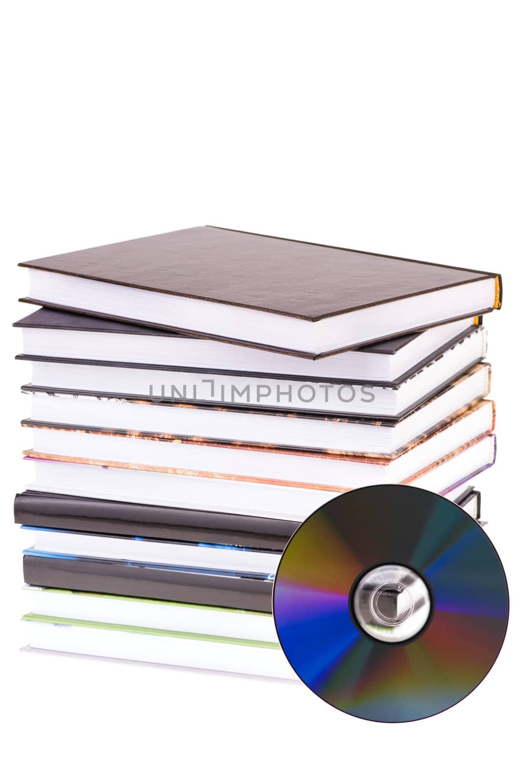 stack books with the dvd disk isolated on white background