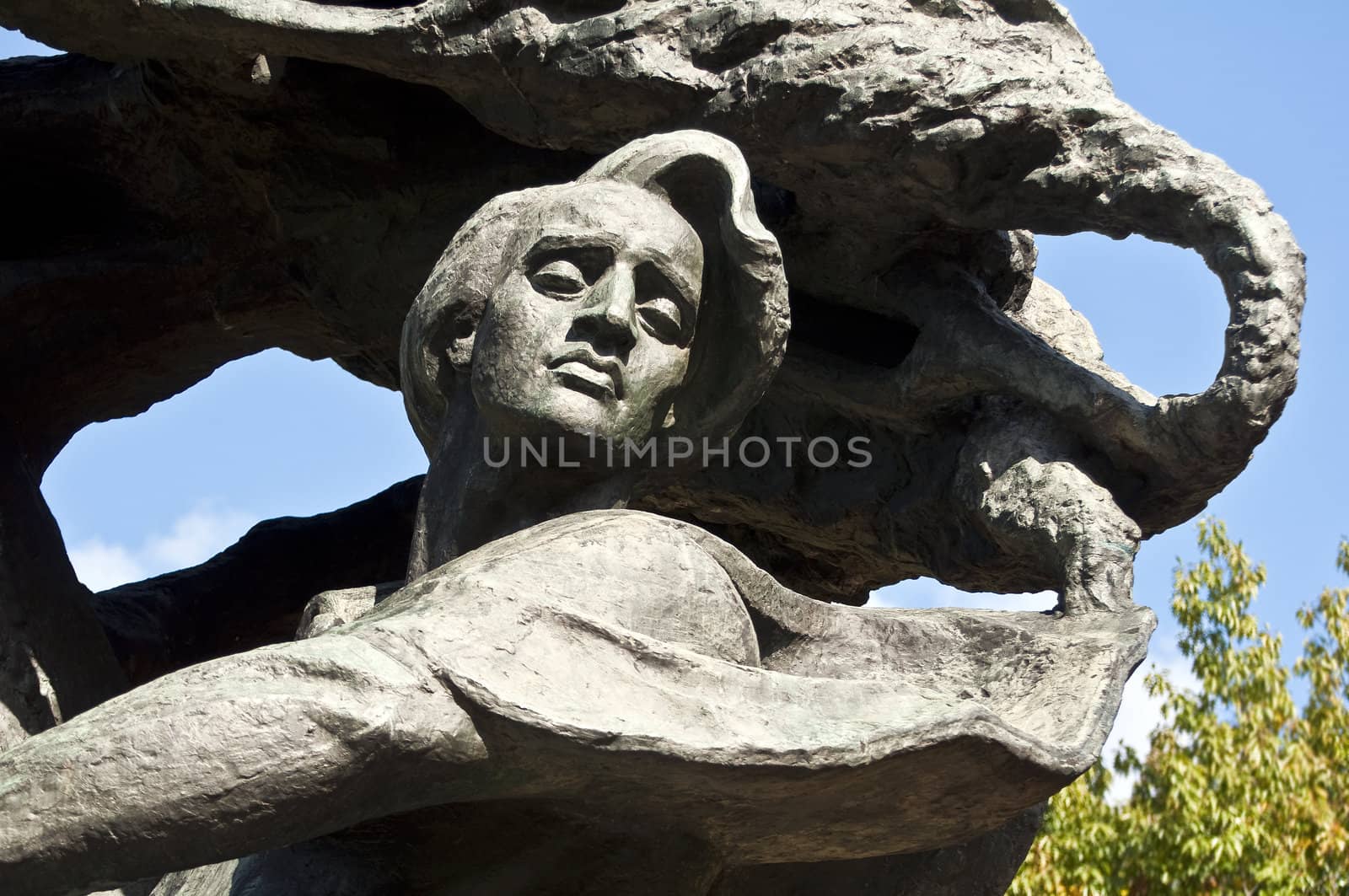 Monument, Frederic Chopin seeking inspiration under a willow tree in Warsaw, Poland.