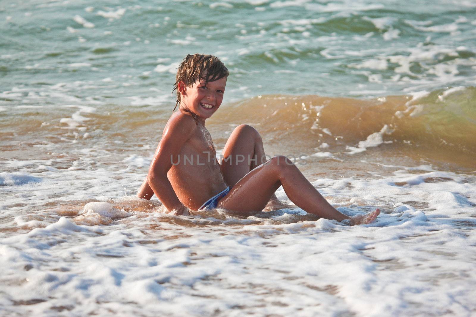 people series: running boy on sea beach