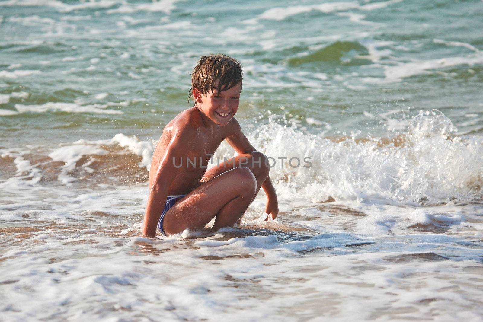 people series: running boy on sea beach