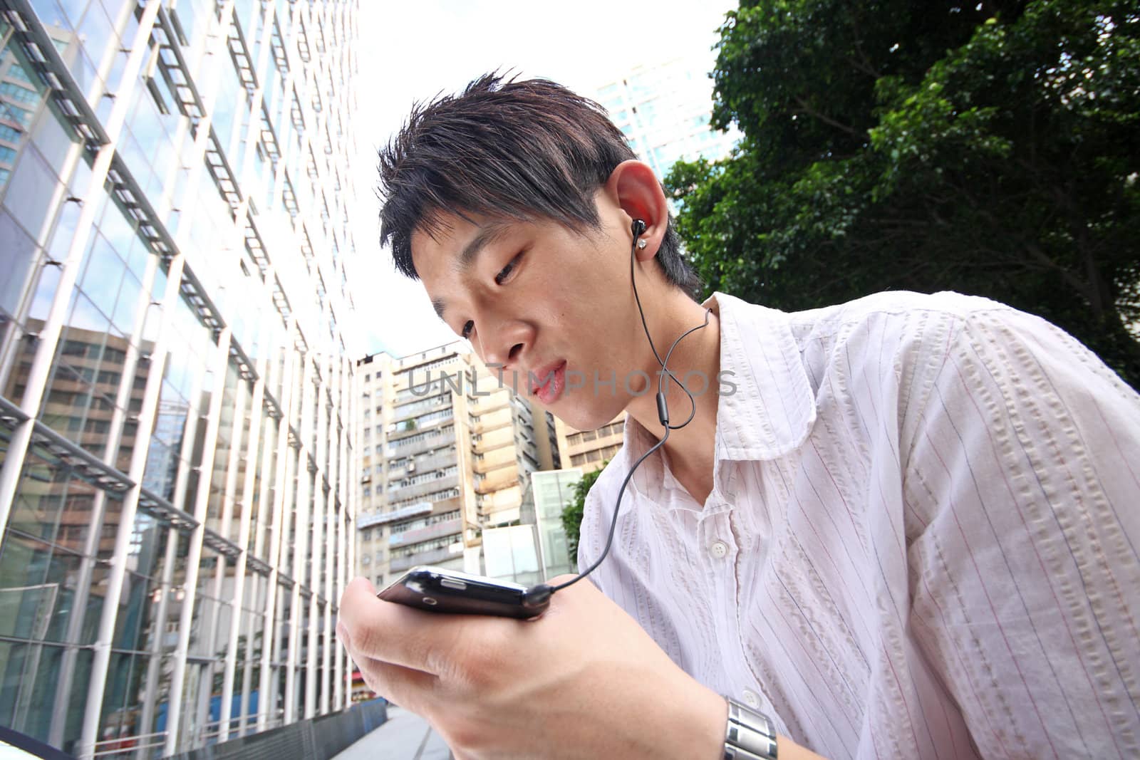 Businessman Using a Hands Free Device 