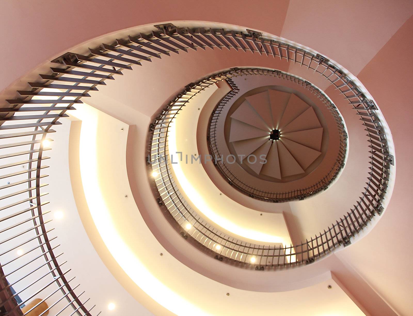 modern designed spiral stair with red top