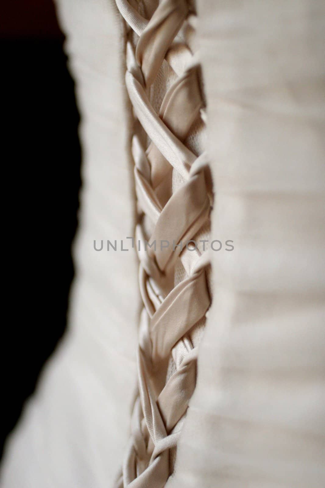 Laced ties of a wedding dress