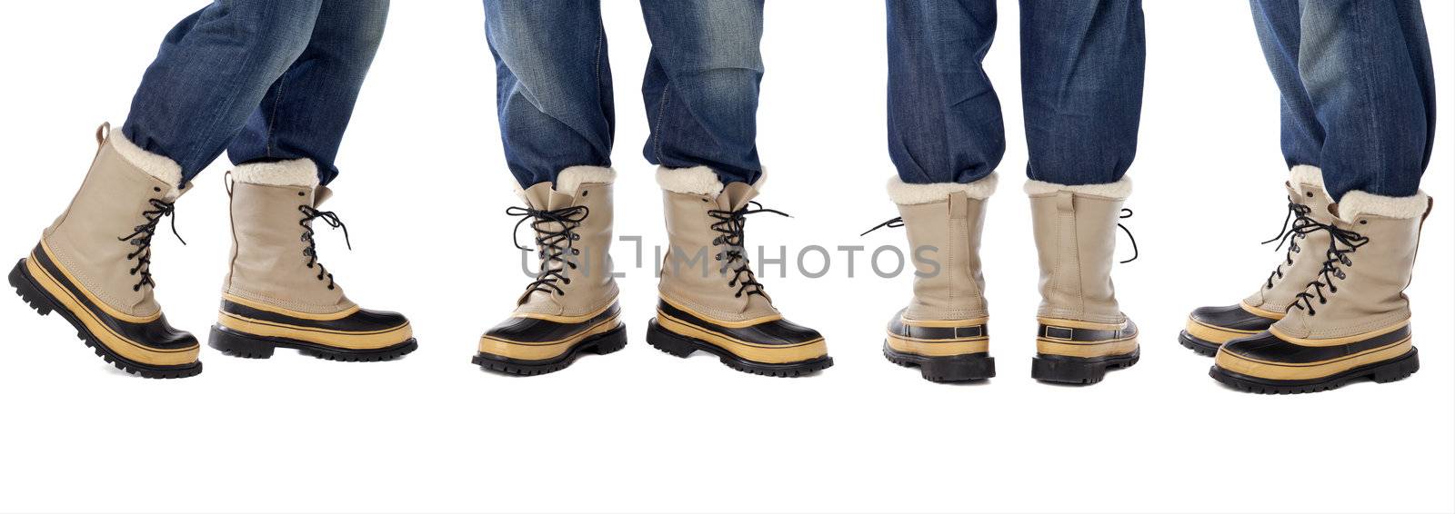 man legs in blue jeans and heavy snow boots, four poses isolated on white