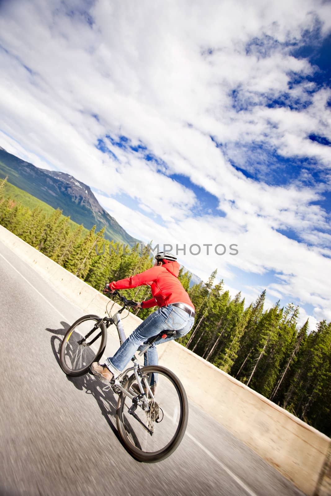 Cycling Up Hill by jrstock