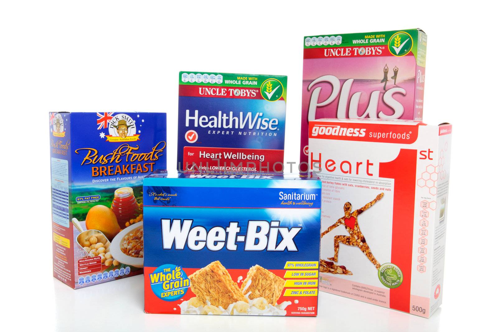 A selection of various boxed healthy breakfast cereals foods. White background, EDITORIAL USE ONLY.