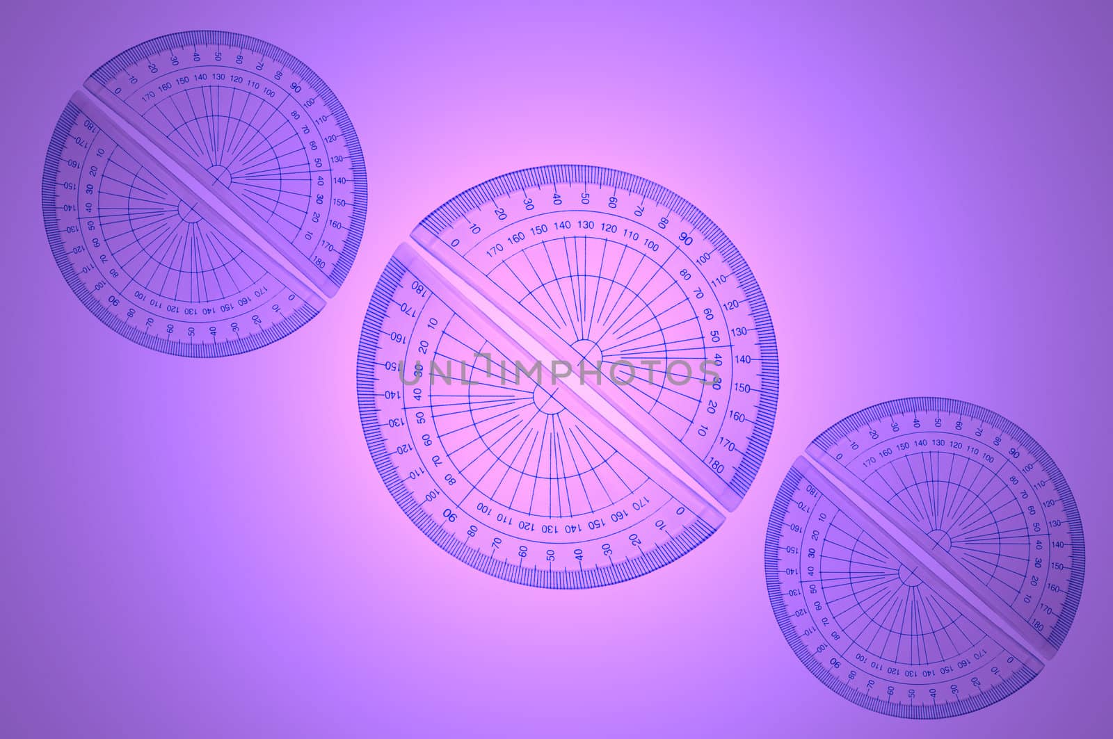 Several blue plastic protractors arranged in formation over a pink and violet light effect background.