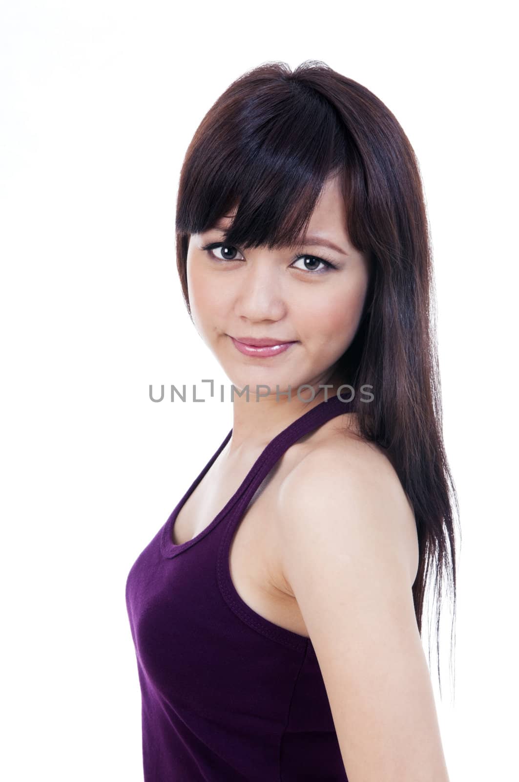 Portrait of an attractive young woman, isolated on white background.