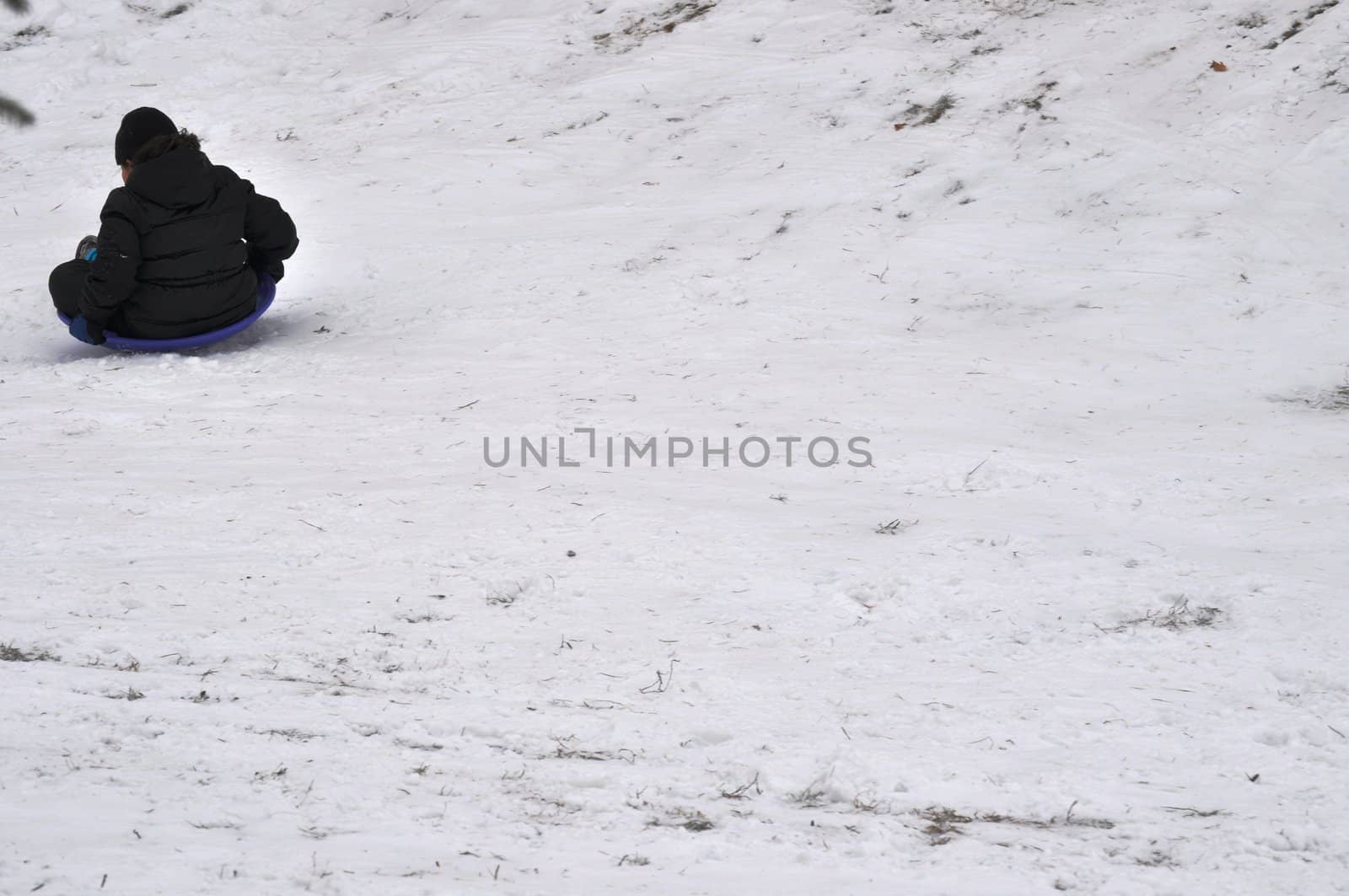 Sledding down the hill - background