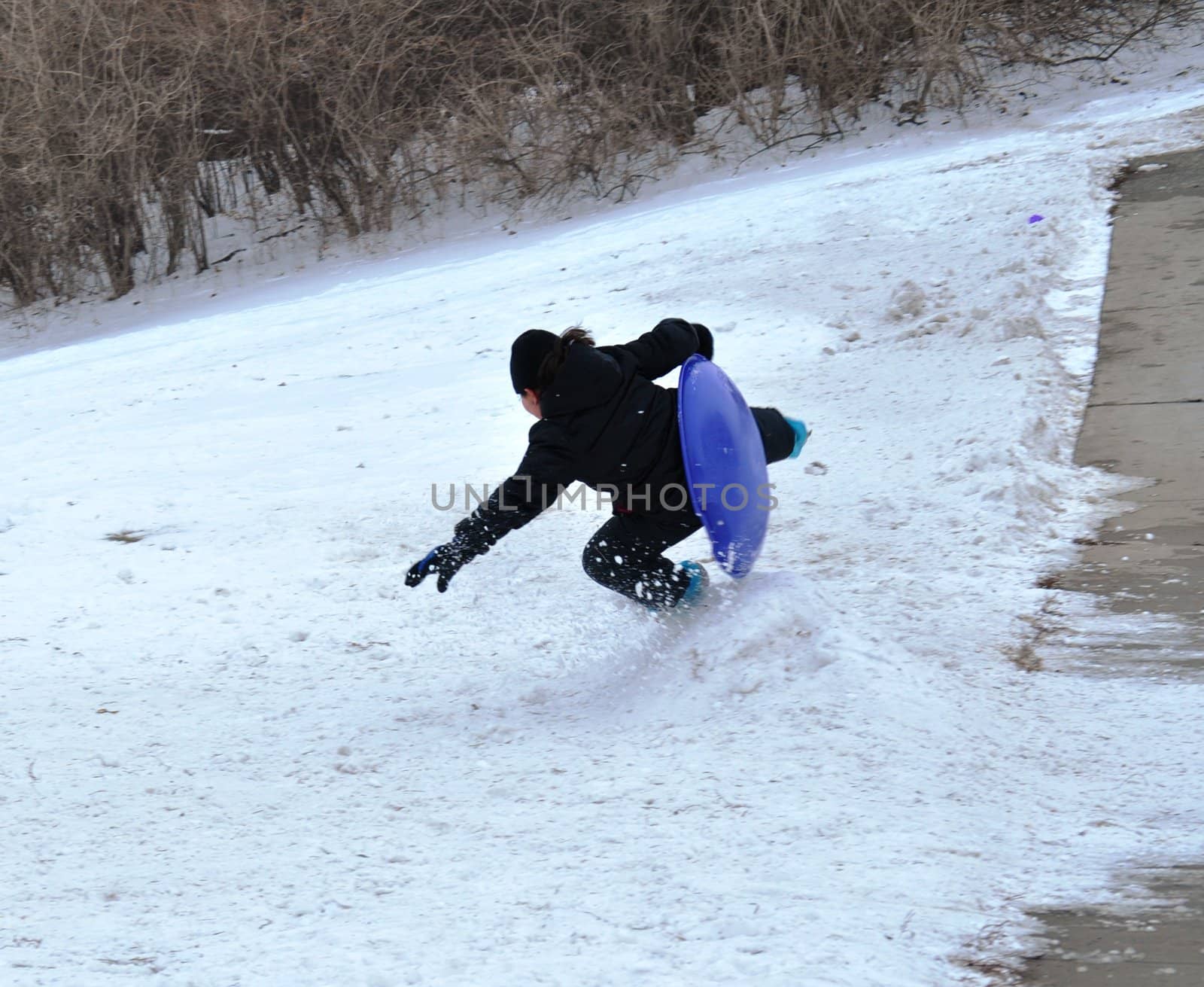 sledding wipeout2 by RefocusPhoto