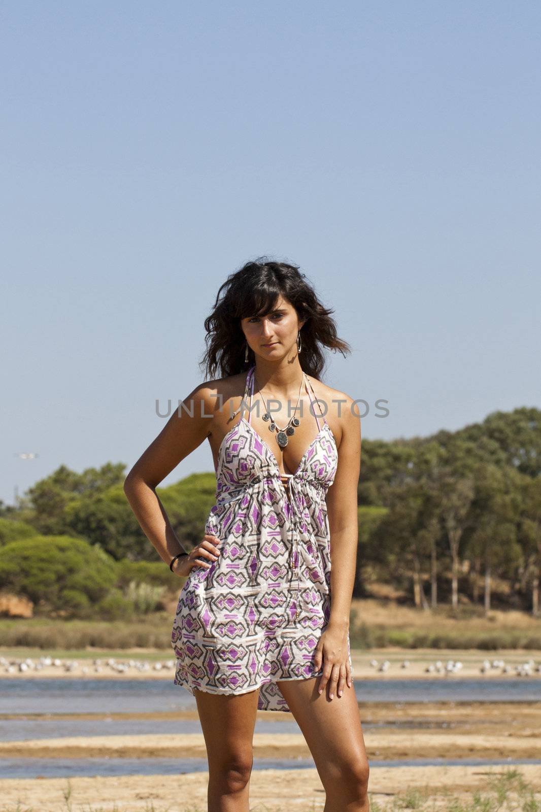 Beautiful girl with dress on a sunny day.