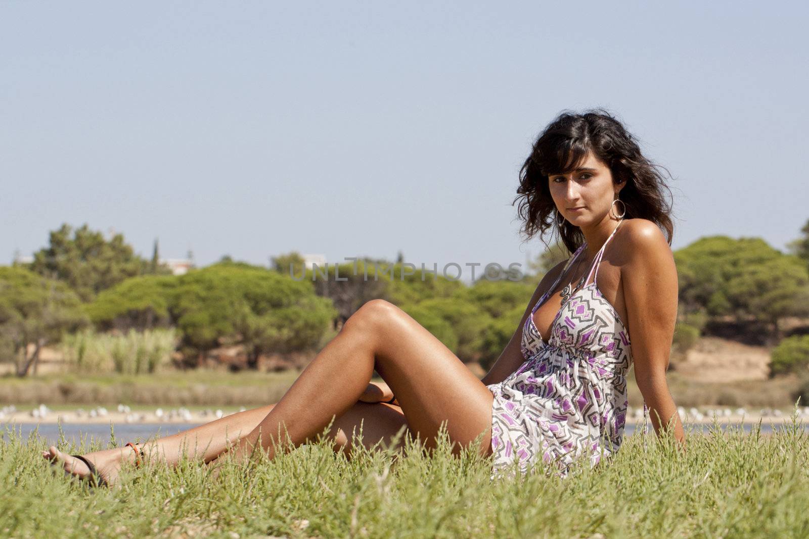 Beautiful girl with dress on a sunny day.
