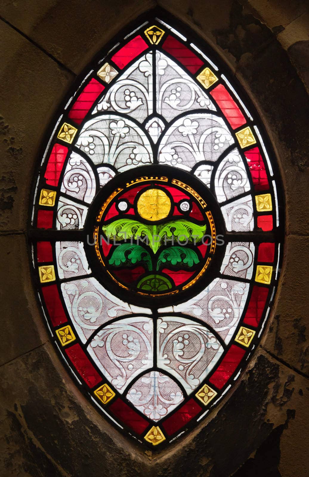 Gothis ornamental stained glass window in a medeval church
