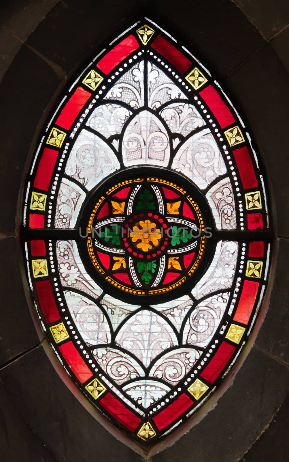 Gothis ornamental stained glass window in a medeval church