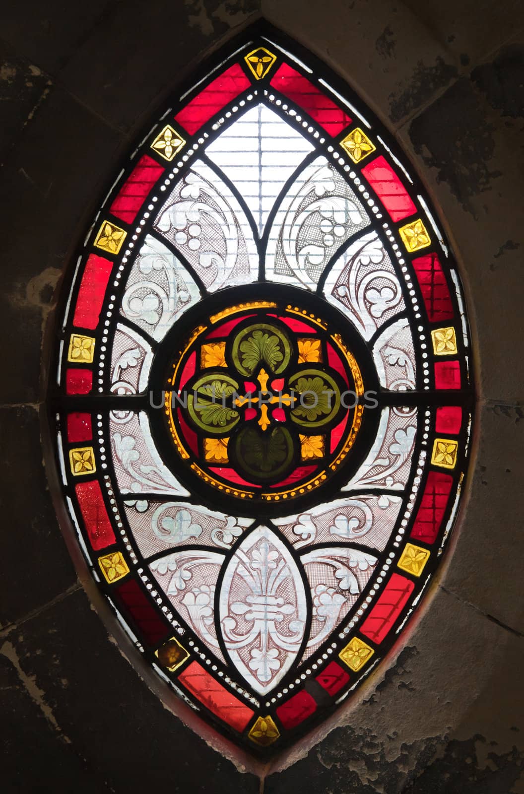 Gothis ornamental stained glass window in a medeval church