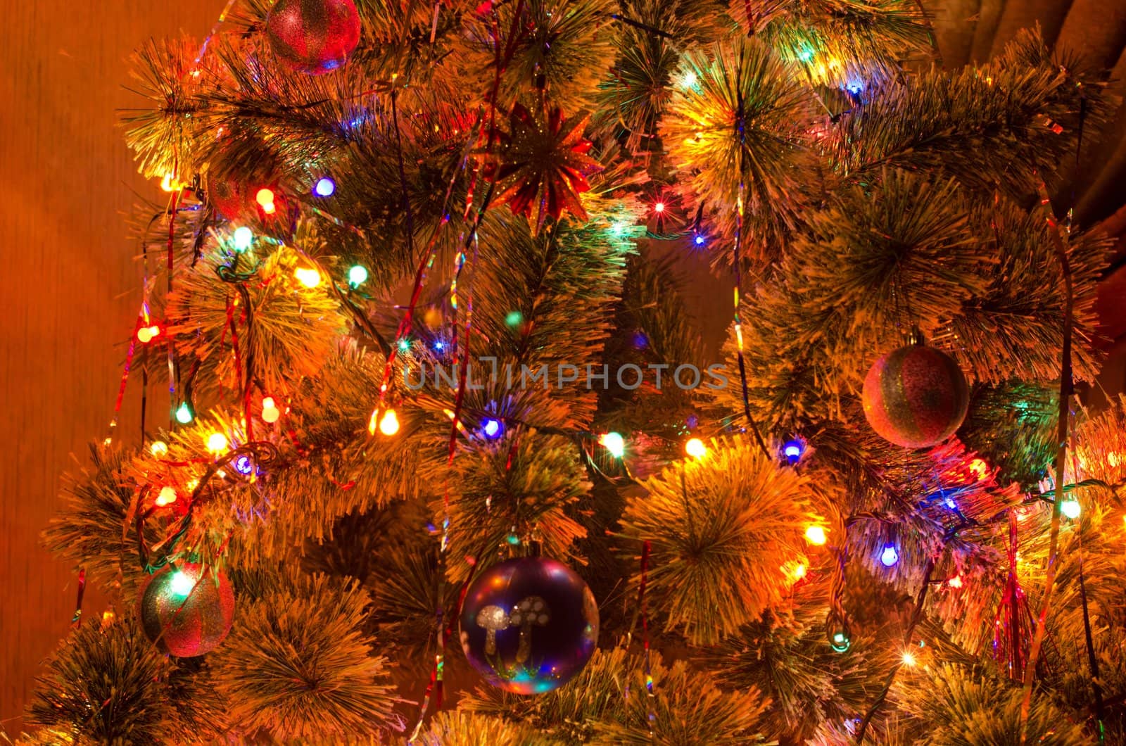 Beautiful Christmas fur-tree decorated with New Year's toys
