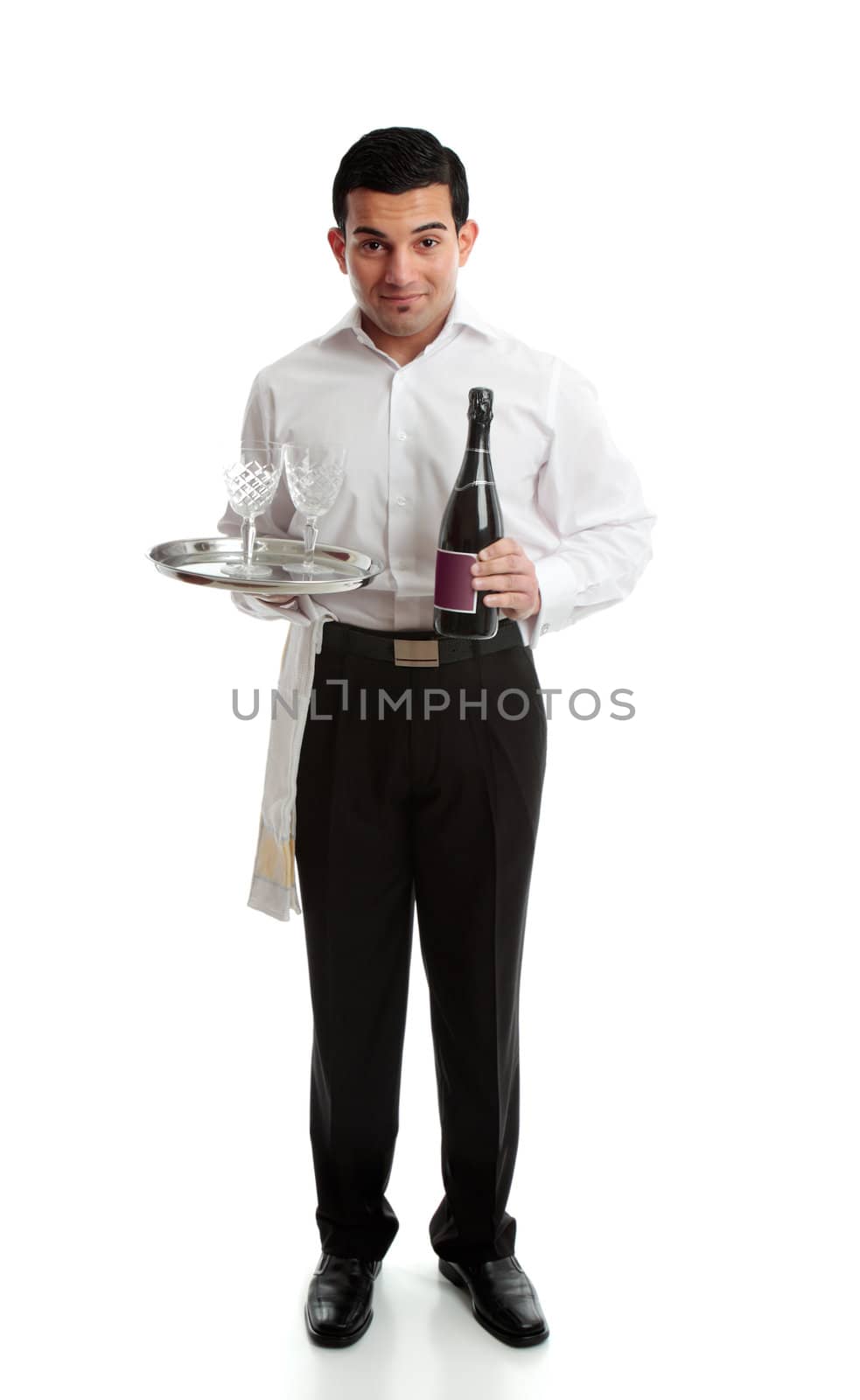 Smiling waiter, bartender or servant holding a bottle of  wine and glasses on a platter.