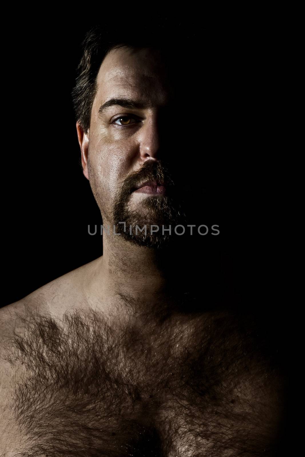 An image of a hairy man in a dark style