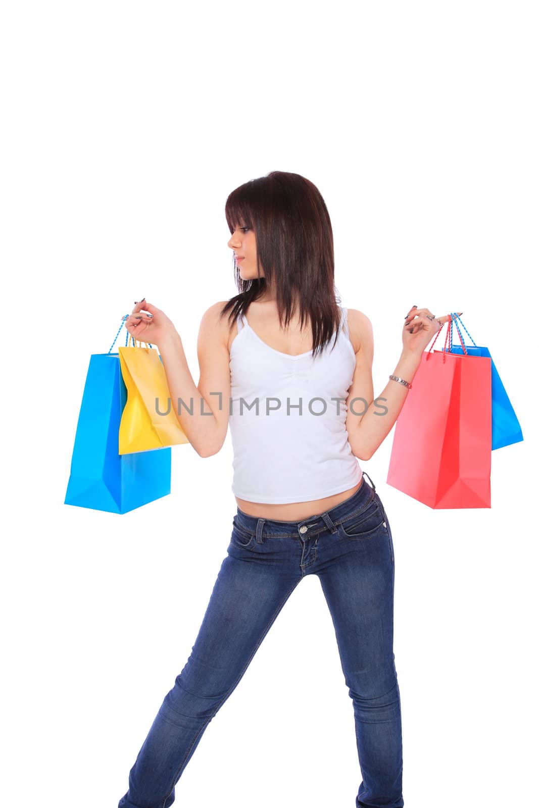 Woman with colorful shopping bags by Netfalls