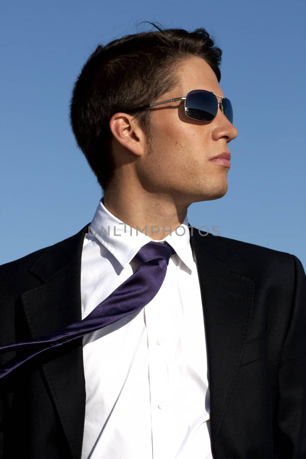 Close up view of a bunisess man in a dark suit.