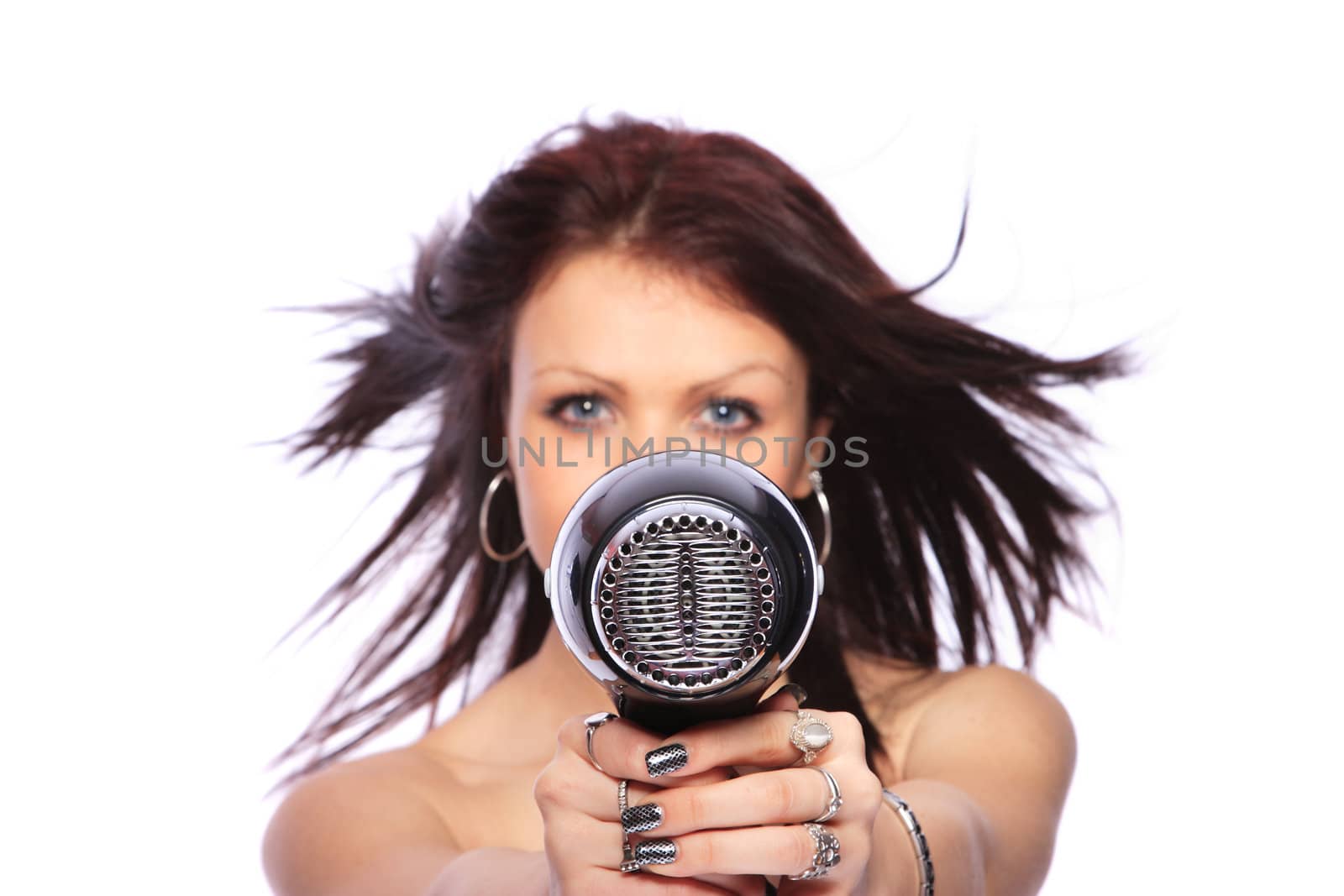 portrait of beautiful young woman with fashion hairstyle holding hairdryer - selective focus
