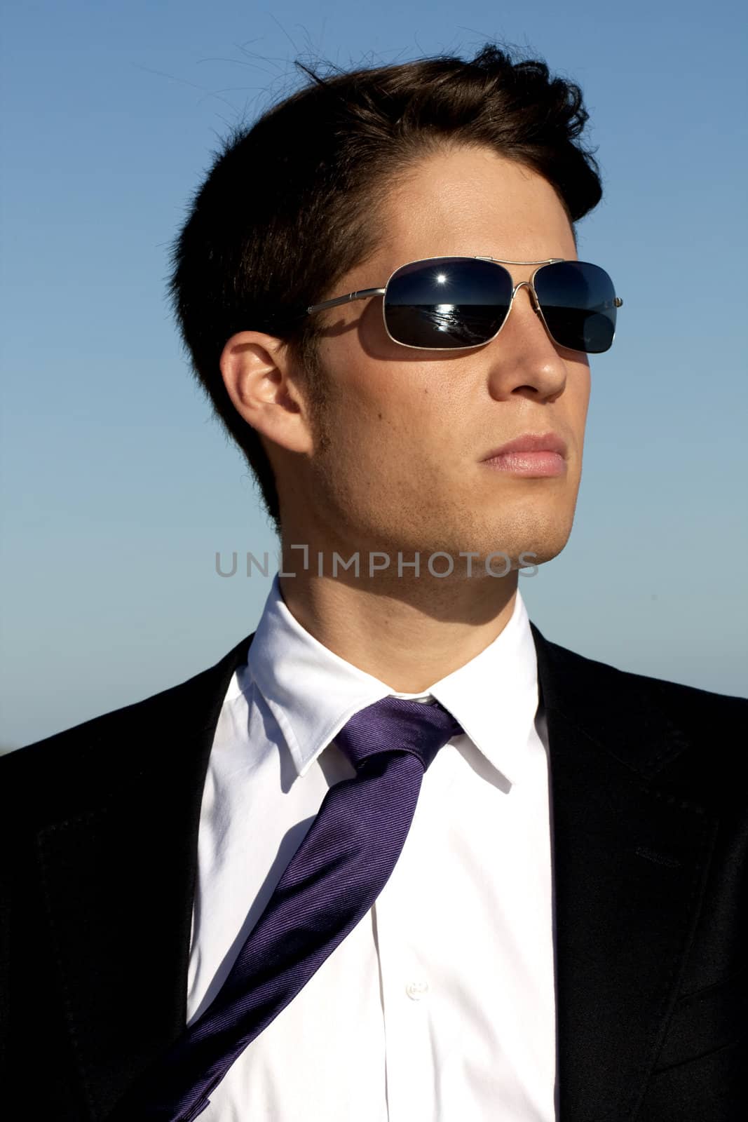 Close up view of a bunisess man in a dark suit.