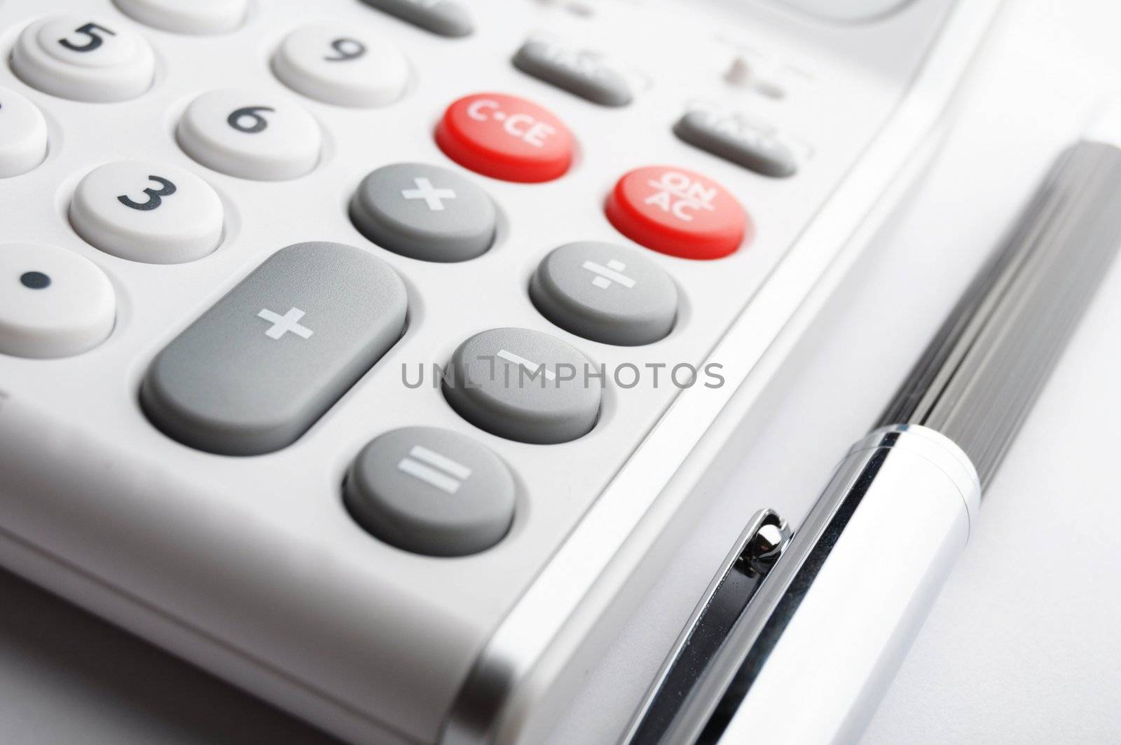 calculator showing business accounting concept in white