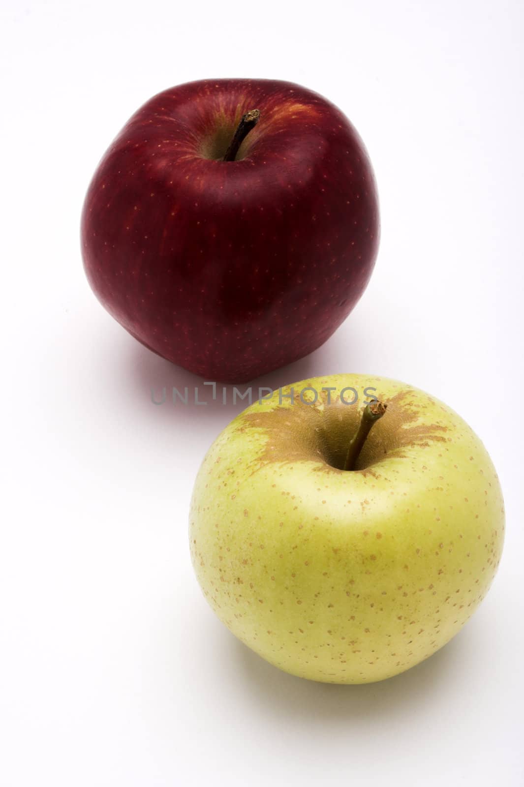 Two apples over white background