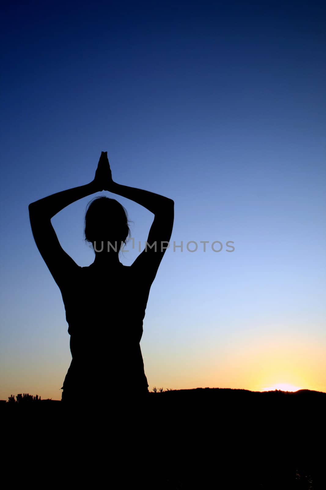 The yoga shadow during sunset