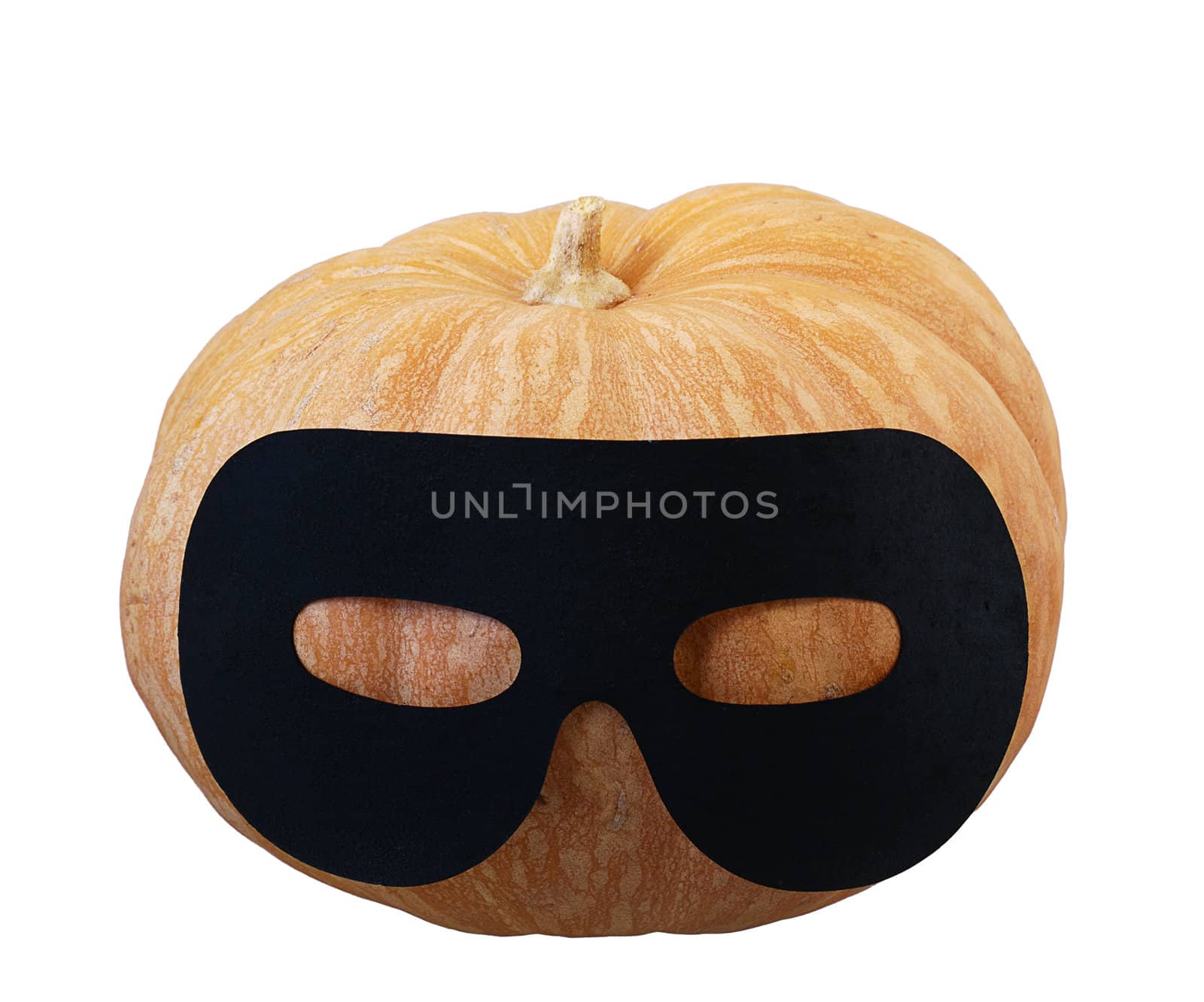 Front view of small Halloween orange pumpkin in black masquerade mask isolated on white background