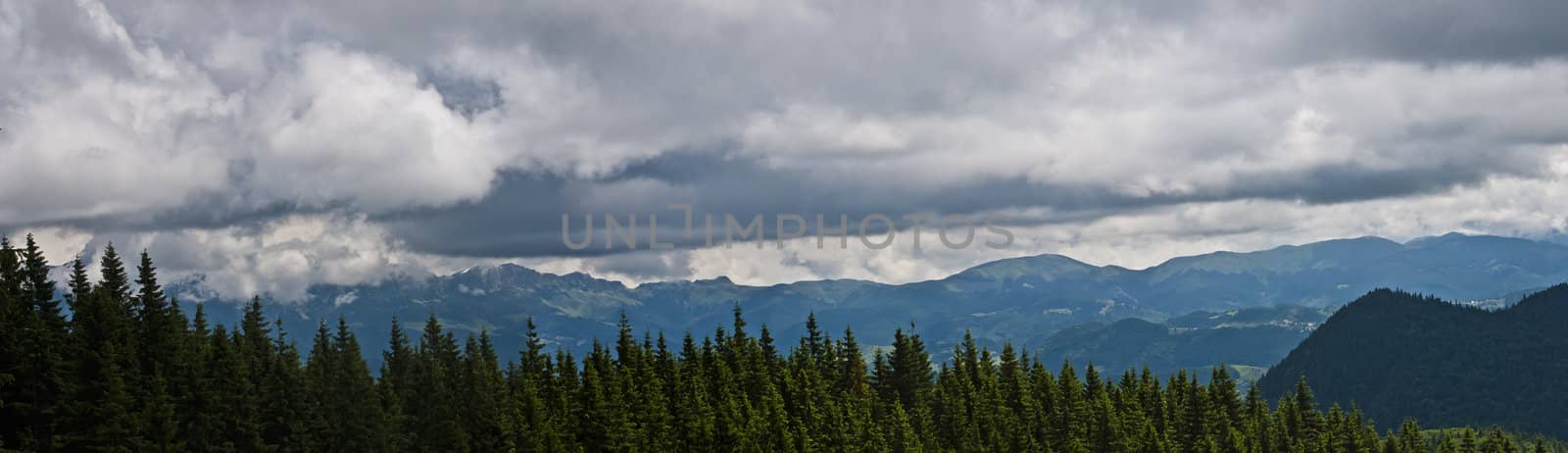 Panorama background in Carpathians. Beautiful mountains and landscape in Romania.