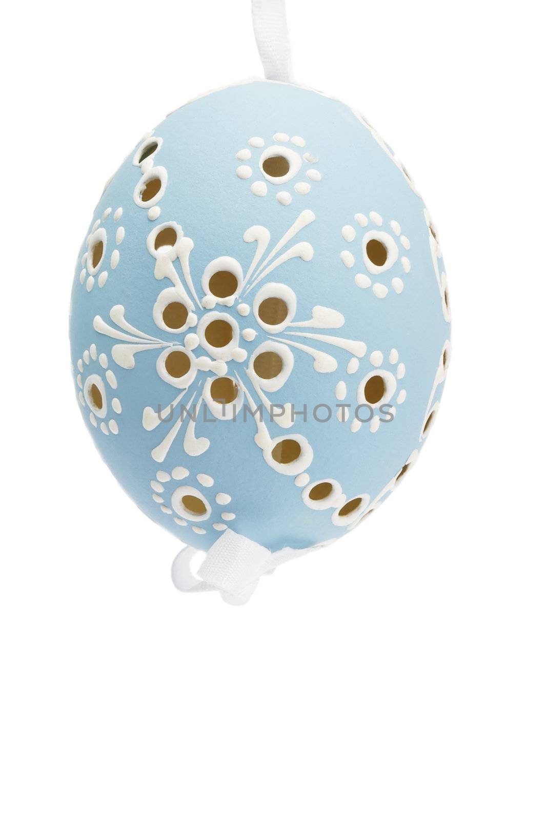 blue hanging hand painted easter egg on white background