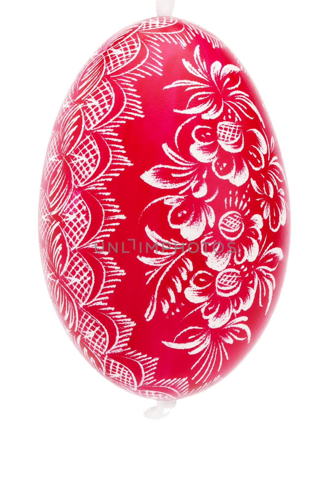 red hanging hand painted easter egg on white background