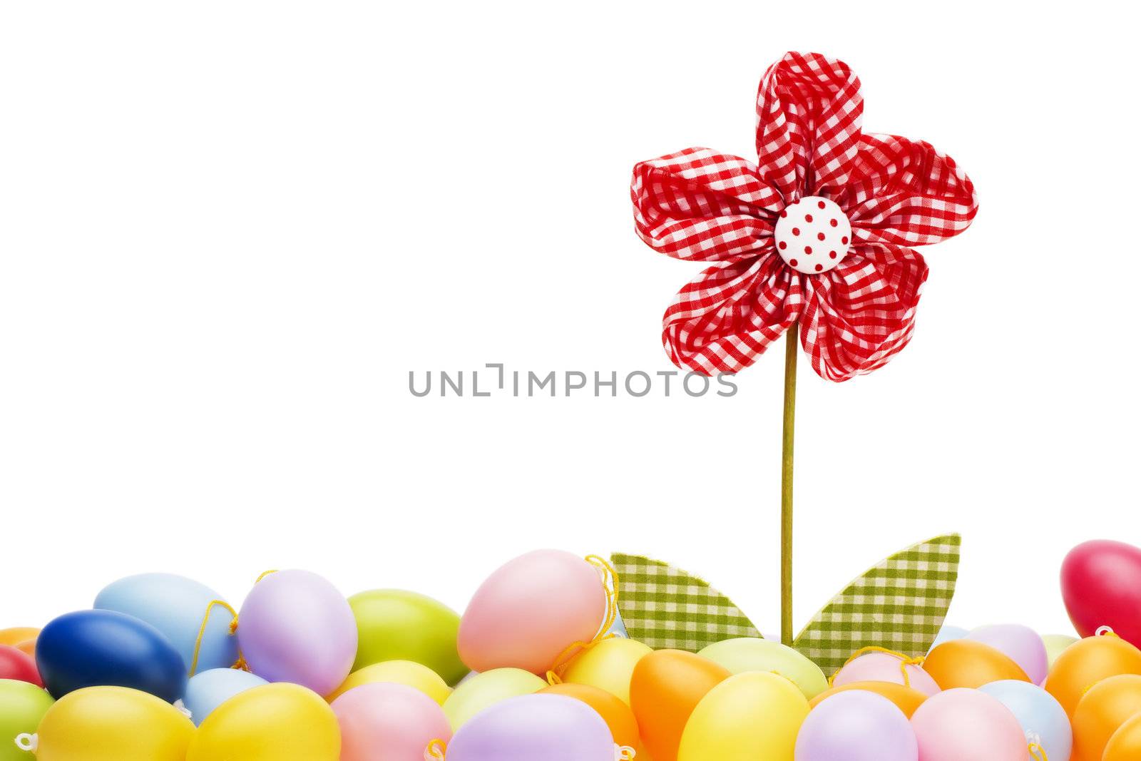 red drapery flower between easter eggs with white background