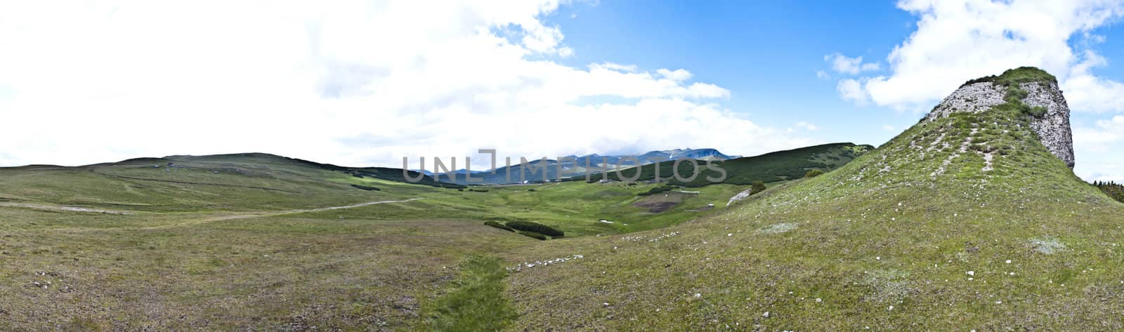 Panorama background in Carpathians. Beautiful mountains and landscape in Romania.