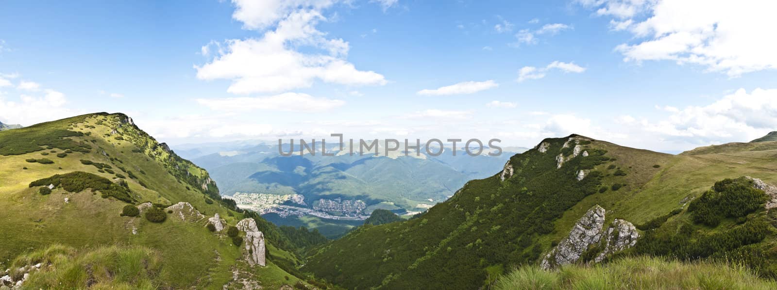 Panorama background in Carpathians. Beautiful mountains and landscape in Romania.