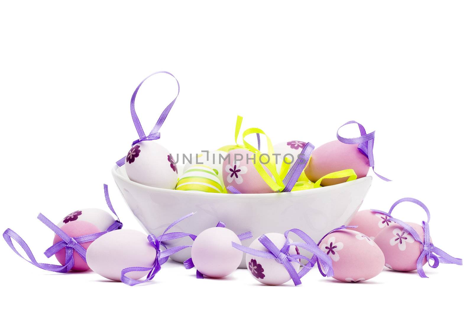 small tender pastel easter eggs in a white bowl white background