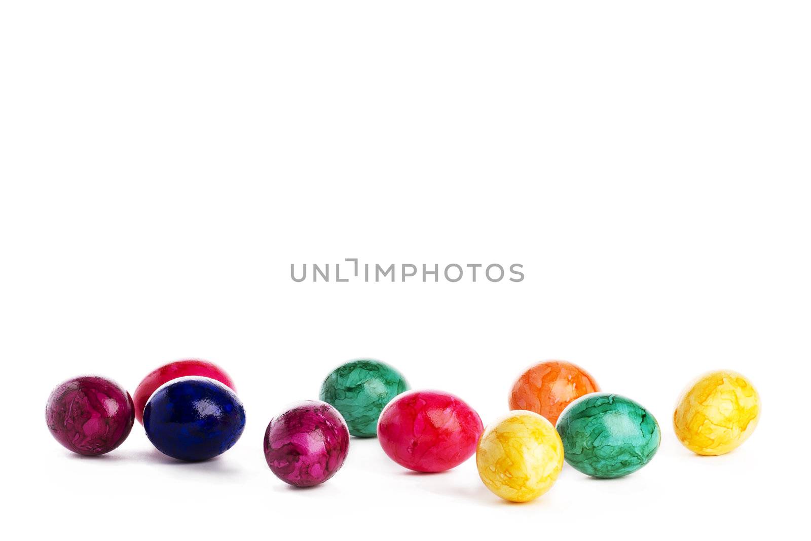 some colorful easter eggs on white background